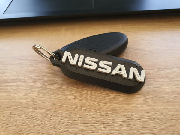 Llavero Nissan Personalizado Numero Telefono O Patente 3d - Imagen 3